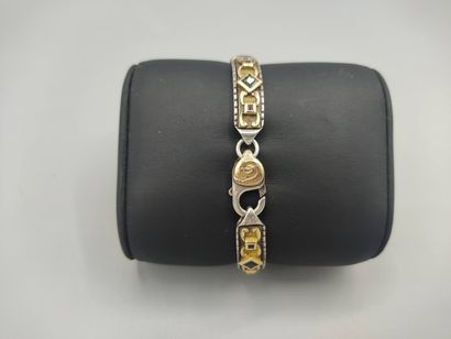 Yellow gold and silver bracelet with geometrical...