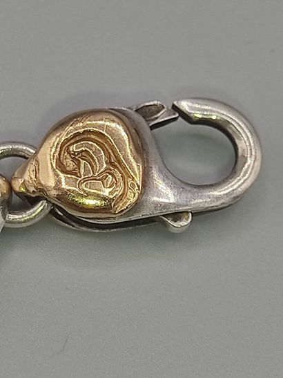 Yellow gold and silver bracelet with geometrical...