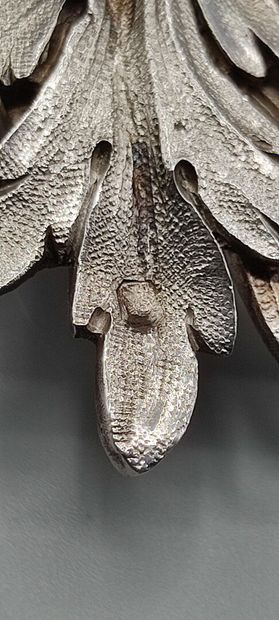 Pair of decorative silver elements (melted...