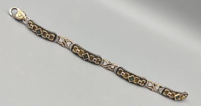 Yellow gold and silver bracelet with geometrical...