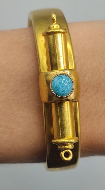 Rigid bracelet in 18KT gold set with a turquoise...