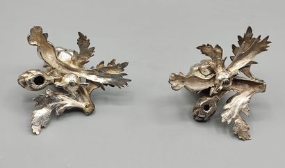 Pair of decorative silver elements (melted...