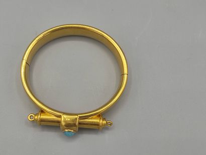 Rigid bracelet in 18KT gold set with a turquoise...
