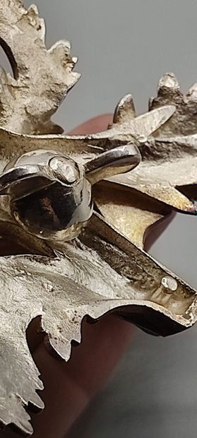 Pair of decorative silver elements (melted...