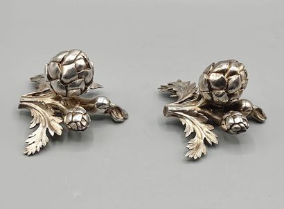 Pair of decorative silver elements (melted...