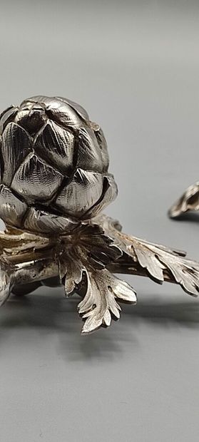 Pair of decorative silver elements (melted...