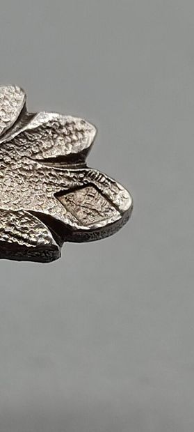 Pair of decorative silver elements (melted...