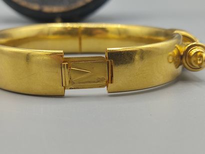 Rigid bracelet in 18KT gold set with a turquoise...