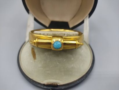 Rigid bracelet in 18KT gold set with a turquoise...