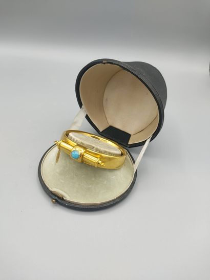 Rigid bracelet in 18KT gold set with a turquoise...