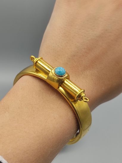 Rigid bracelet in 18KT gold set with a turquoise...