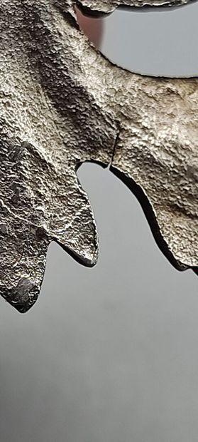 Pair of decorative silver elements (melted...