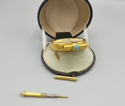 Rigid bracelet in 18KT gold set with a turquoise...