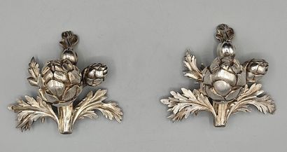 Pair of decorative silver elements (melted...