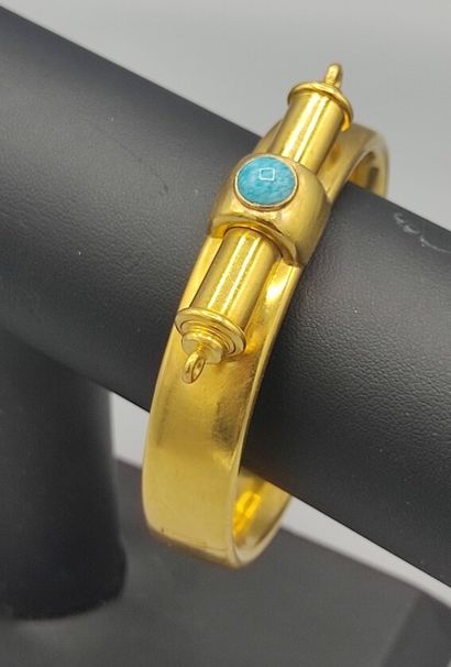 Rigid bracelet in 18KT gold set with a turquoise...