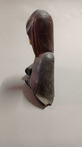 Bust of Holy Woman.

Carved polychrome wood...