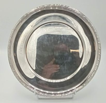 Gustave ODIOT.

Grand plat rond en argent...