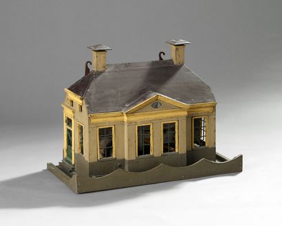 Importante cage à oiseaux figurant une maison...