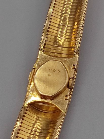 ARIEL, Swiss mvt

Montre de dame en or jaune...