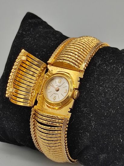 ARIEL, Swiss mvt

Montre de dame en or jaune...