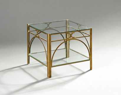 BRONCZ, éditeur.

Table basse en laiton doré.

Les...