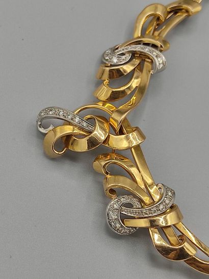 Collier draperie en or jaune 750°° semi articulé...