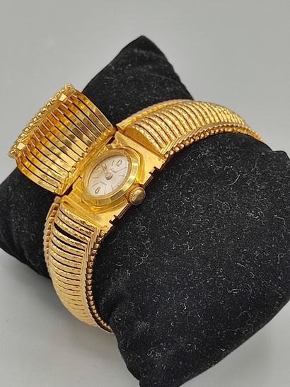 ARIEL, Swiss mvt

Montre de dame en or jaune...