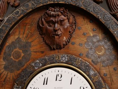 Curieuse pendulette en bois de placage et...