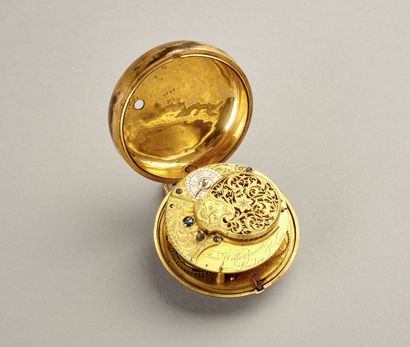 Rare montre dite de carrosse en bronze doré.

Mouvement...