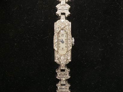 Montre de dame en platine 850°° ornée de...
