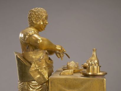 Curieuse pendule en bronze doré et ciselé...
