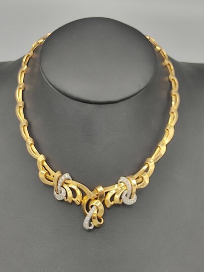 Collier draperie en or jaune 750°° semi articulé...