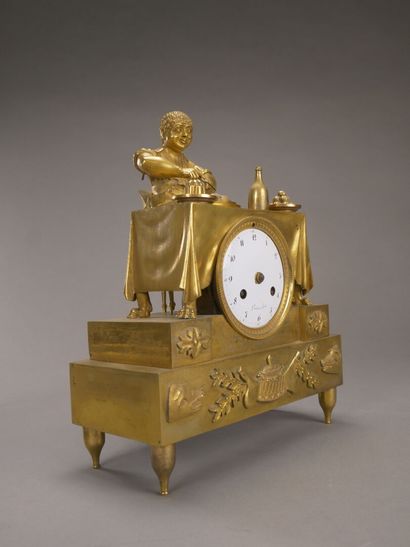Curieuse pendule en bronze doré et ciselé...