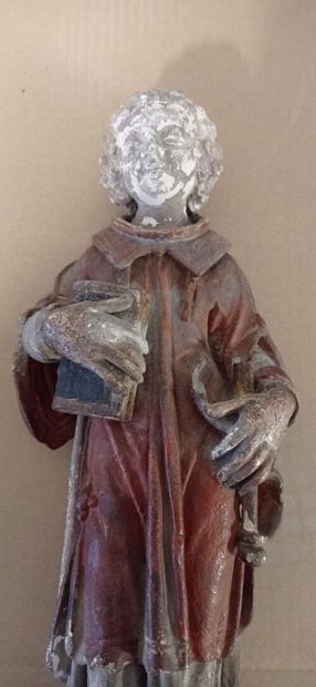 Saint diacre en pierre calcaire sculptée...