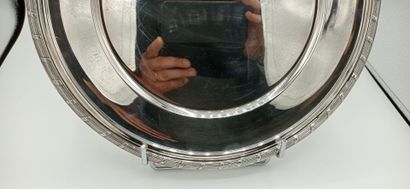 Gustave ODIOT.

Grand plat rond en argent...