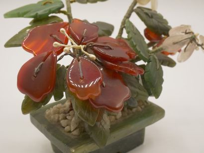 CHINE

Plante au naturel en pierres dures...