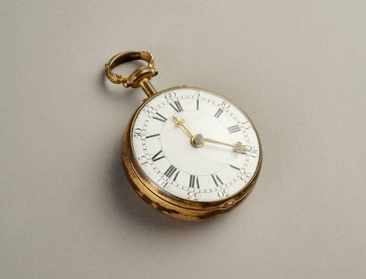 Rare montre dite de carrosse en bronze doré.

Mouvement...
