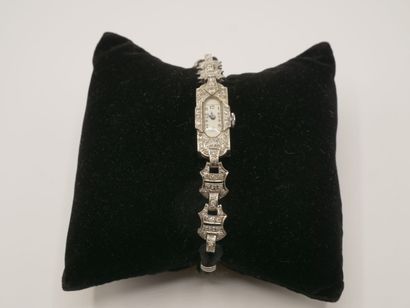 Montre de dame en platine 850°° ornée de...