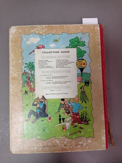 Manette comprenant:

- Un lot de livre (Tintin...
