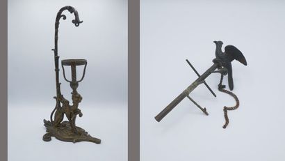 Pied de lampe en bronze à décor d'un griffon.

Fin...