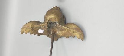 Paire d'éléments figurant des tête d'angelots.

Bronze...