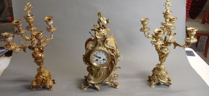 Garniture de cheminée en bronze doré et ciselé...