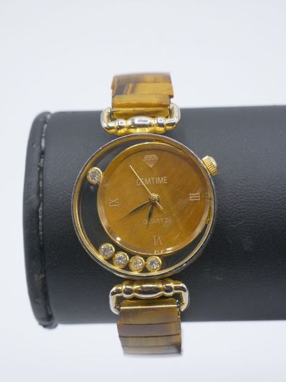Lot montres en métal doré. Cadran circulaire....