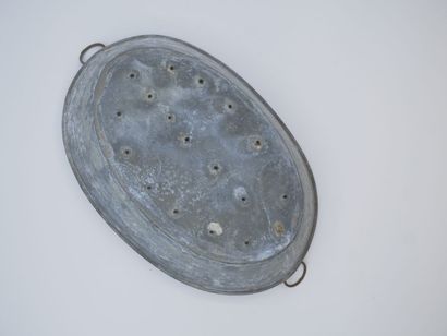 Intérieur de jardinière en zinc aux prises...