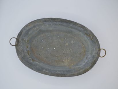 Intérieur de jardinière en zinc aux prises...