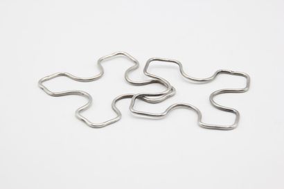 Pair of silver trivets or bottles.

Minerva...