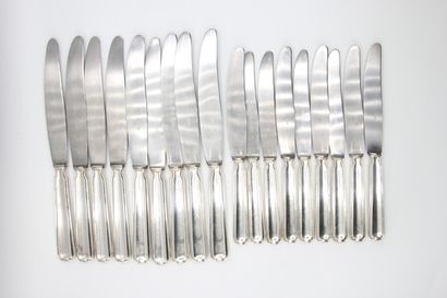 Double set of knives with silver handles...