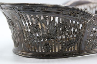 Silver basket with openwork border decorated...