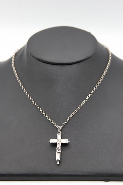 Antique silver reliquary cross. 

The cross...