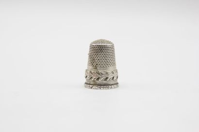 Silver thimble.

French title mark 